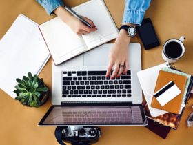 stylish young girl working economist financial analytics holding pen with laptop